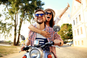 two people on a motorcycle