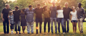 group of people smiling outside