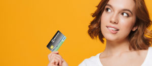 person holding credit card