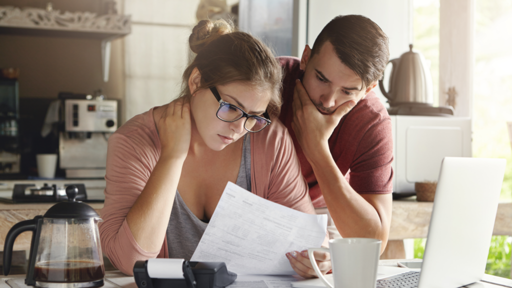 couple looking at bills