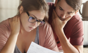 couple looking at bills