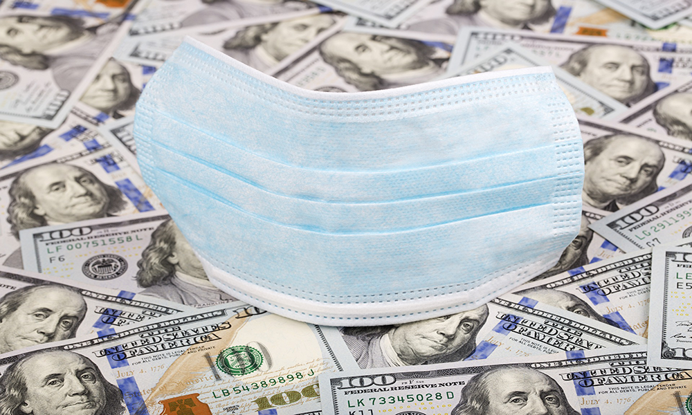 American currency and medical face mask