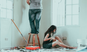 home improvement couple painting home