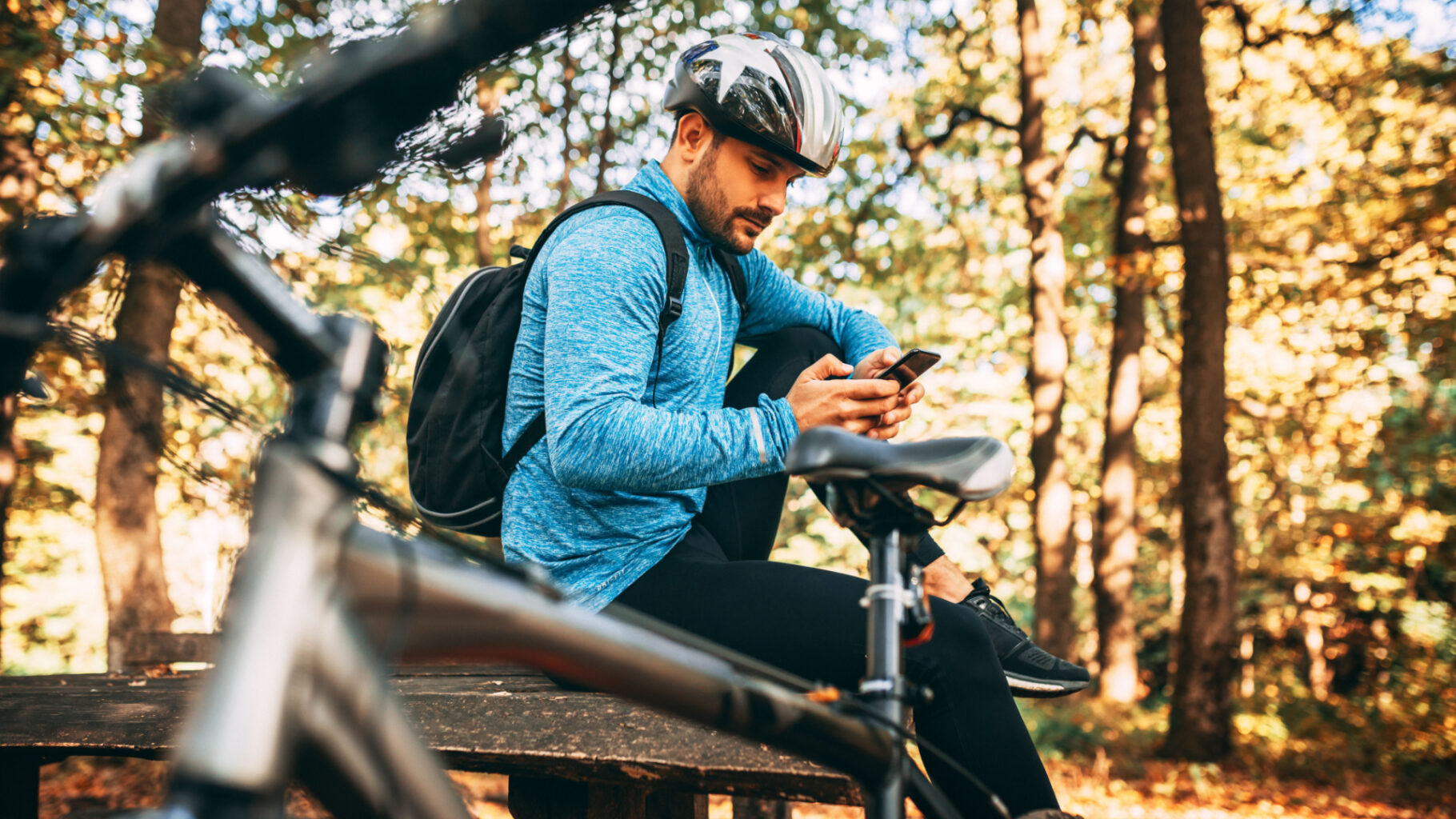 person sitting after biking